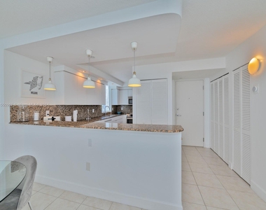 6917 Collins Ave - Photo Thumbnail 3