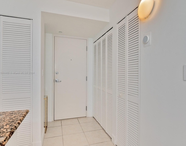 6917 Collins Ave - Photo Thumbnail 1