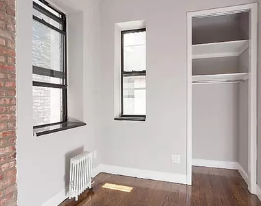 210 East 25th Street - Photo Thumbnail 2