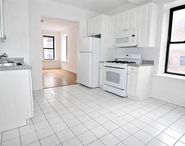 E 38th St - Photo Thumbnail 2