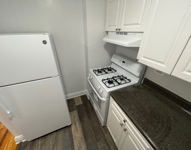 102-30 67th Avenue - Photo Thumbnail 4