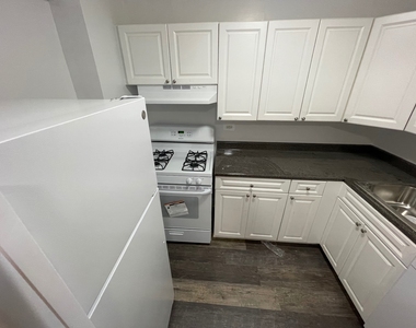 102-30 67th Avenue - Photo Thumbnail 1