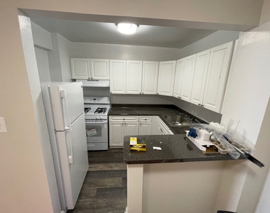 102-30 67th Avenue - Photo Thumbnail 3