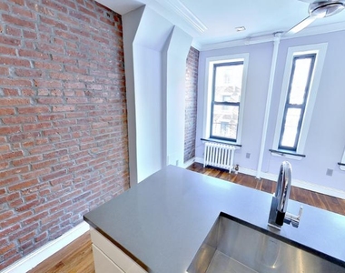 234 Mott St - Photo Thumbnail 1