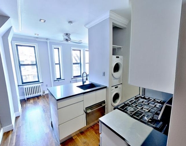 234 Mott St - Photo Thumbnail 0