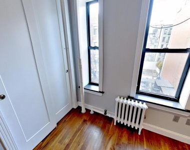 234 Mott St - Photo Thumbnail 4