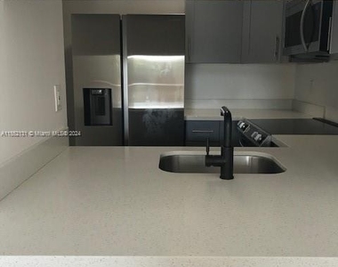 9350 Fontainebleau Blvd - Photo Thumbnail 2