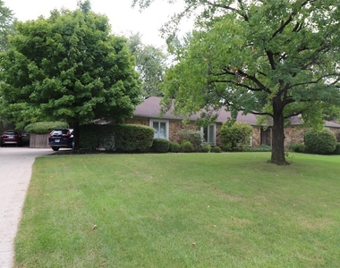 10909 W Lakeshore Drive - Photo Thumbnail 1