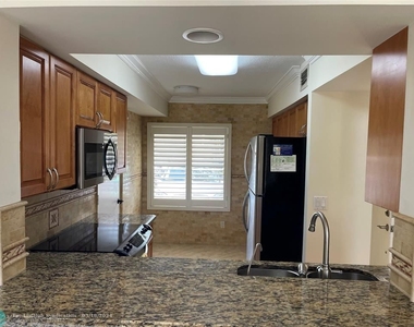 1724 Royal Palm Way - Photo Thumbnail 6