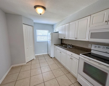 7208 S Kissimmee Street - Photo Thumbnail 4