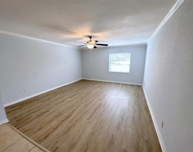 7208 S Kissimmee Street - Photo Thumbnail 3