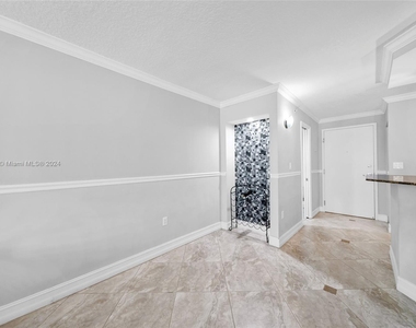 6917 Collins Ave - Photo Thumbnail 18