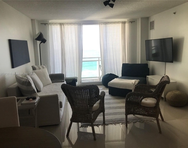 6917 Collins Ave - Photo Thumbnail 1