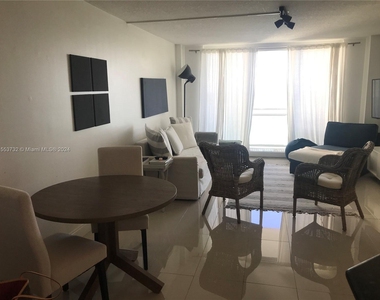 6917 Collins Ave - Photo Thumbnail 3