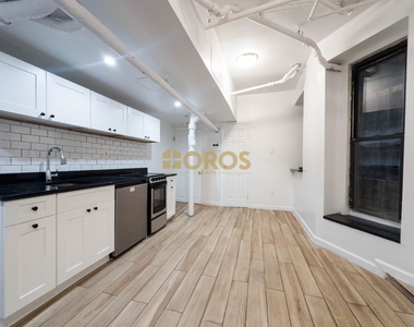 213 East 10th Street - Photo Thumbnail 2