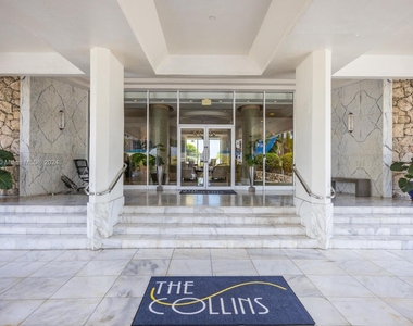 6917 Collins Ave - Photo Thumbnail 1