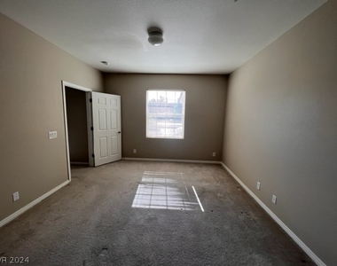 8777 W Maule Avenue - Photo Thumbnail 3