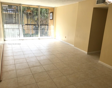 8841 W Flagler St - Photo Thumbnail 1