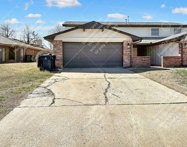 11713 N Francis Ave - Photo Thumbnail 1