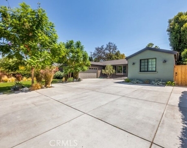 16446 Moorpark St - Photo Thumbnail 1