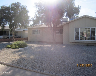 8303 E Glenrosa Avenue - Photo Thumbnail 1