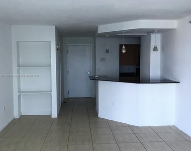 6917 Collins Ave - Photo Thumbnail 4