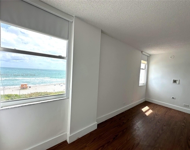 6039 Collins Ave - Photo Thumbnail 9