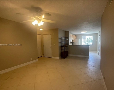 5781 Riverside Dr - Photo Thumbnail 2