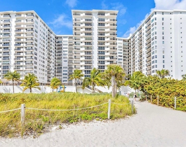 6039 Collins Ave - Photo Thumbnail 1