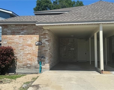 4823 W Metairie Avenue - Photo Thumbnail 1