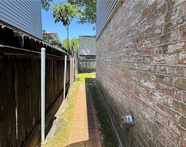 4823 W Metairie Avenue - Photo Thumbnail 6