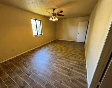 4823 W Metairie Avenue - Photo Thumbnail 12