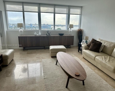 10275 Collins Ave - Photo Thumbnail 1