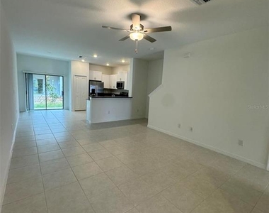 8213 Crescent Oaks Drive - Photo Thumbnail 2