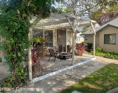 7764 Poplar Ave - Photo Thumbnail 1