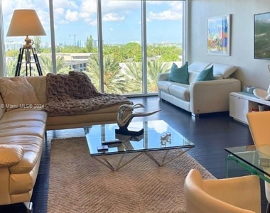 10275 Collins Ave - Photo Thumbnail 2