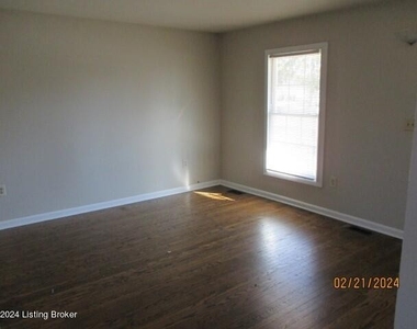 5611 Littleridge Dr - Photo Thumbnail 3