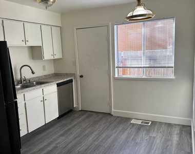 1408 E. 9th St. Unit #12 - Photo Thumbnail 1