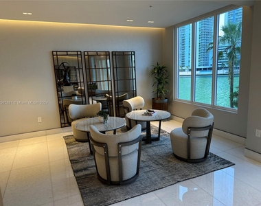 888 Brickell Key Dr - Photo Thumbnail 2