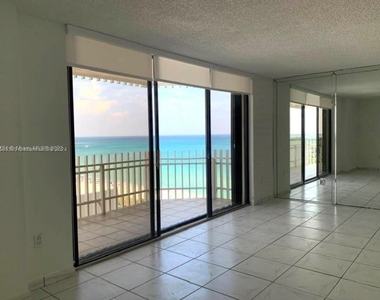 6061 Collins Ave - Photo Thumbnail 1