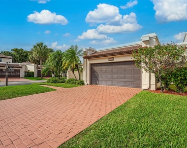 9339 Nw 50th Doral Cir - Photo Thumbnail 1