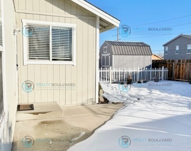 9970 Rock River Dr. - Photo Thumbnail 3