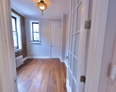 214 East 25th Street - Photo Thumbnail 5