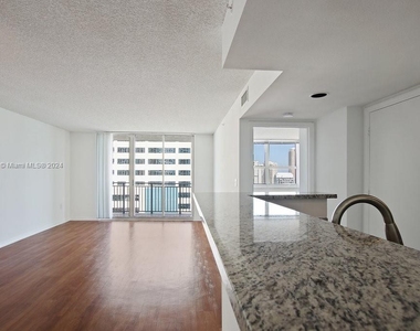 1111 Brickell Bay Dr - Photo Thumbnail 1