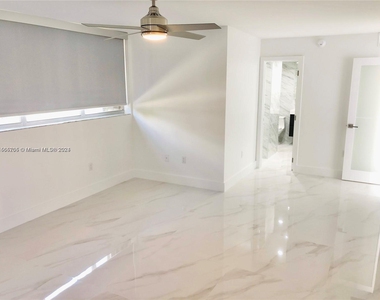 10230 Collins Ave - Photo Thumbnail 7