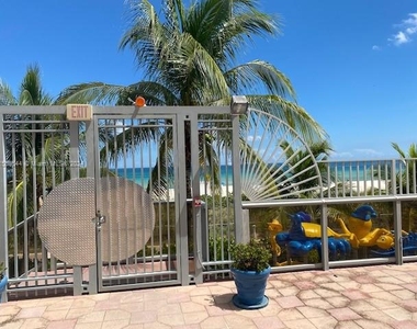 6039 Collins Ave - Photo Thumbnail 40