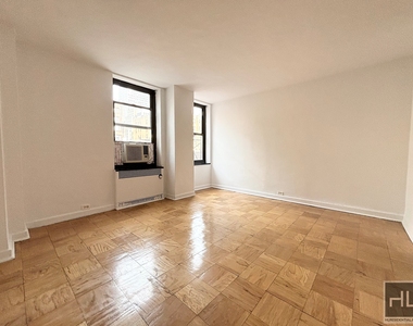 East 38 Street - Photo Thumbnail 2