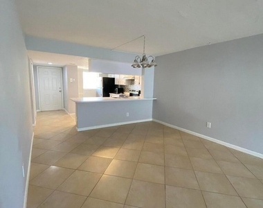 1702 Palm Beach Trace Drive - Photo Thumbnail 6