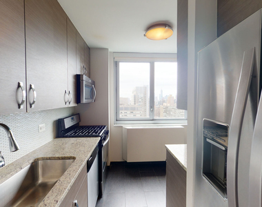 401 E 34th St - Photo Thumbnail 2