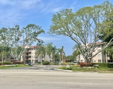 9520 Seagrape Dr - Photo Thumbnail 1